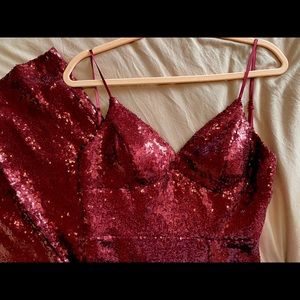 Beautiful Red sequin dress with leg slit.